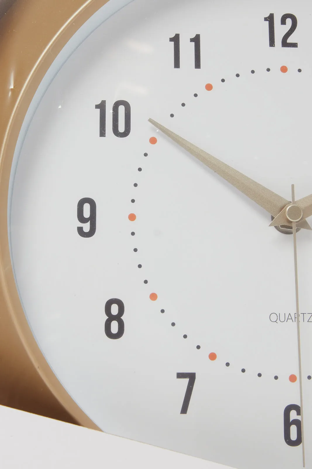 Brown And White Wall Clock With Numbers And Plain Frame