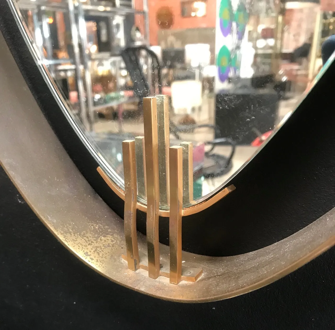 Oval Wall Mirror with Iron Floating and Brass Style Frame. Italy, 1970s