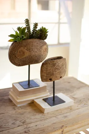 Set Of Two Repurposed Wooden Cow Bell Planters On Iron Stands